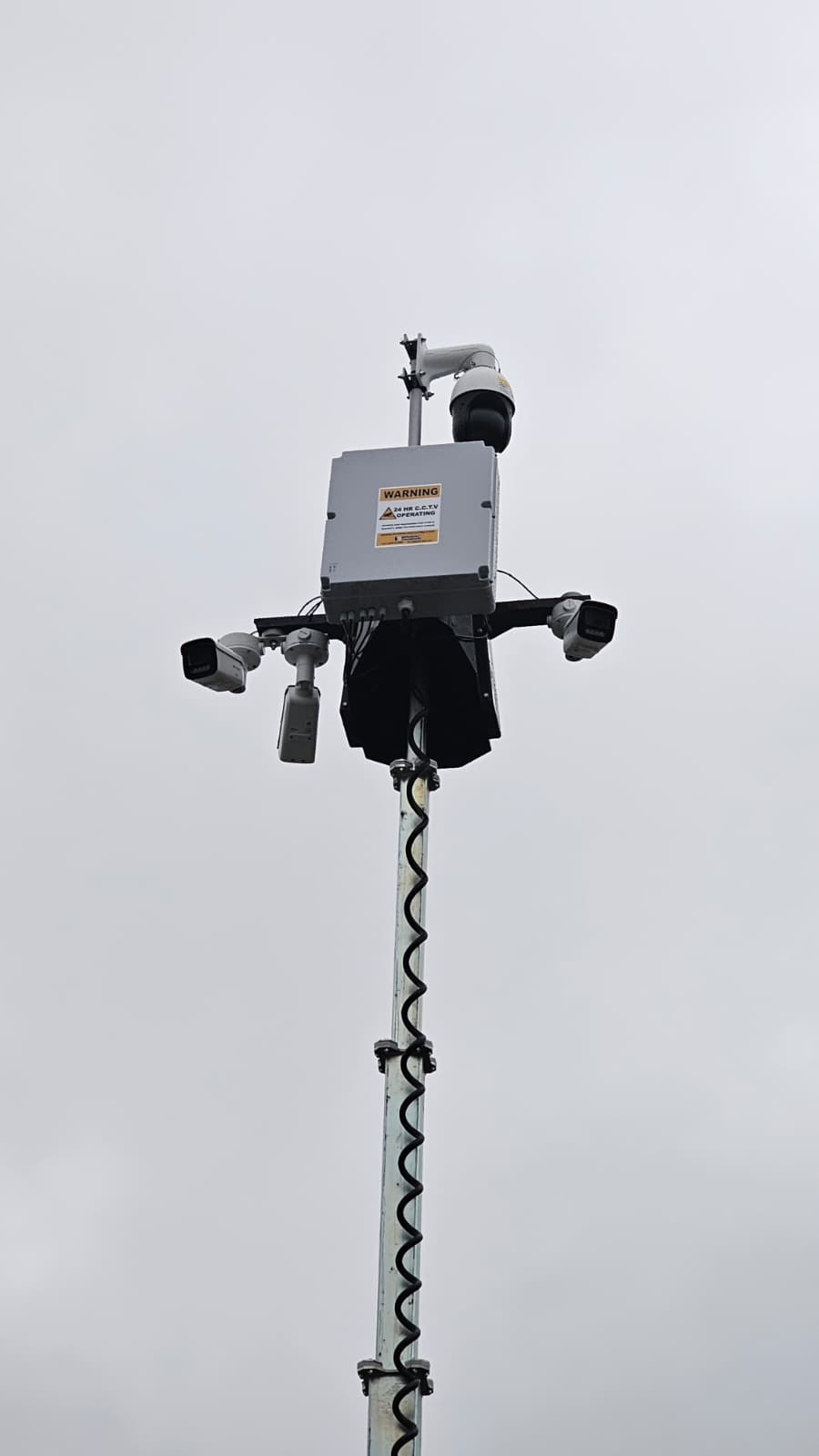 Brimac tower camera head with multiple surveillance cameras and 24hr CCTV warning sign